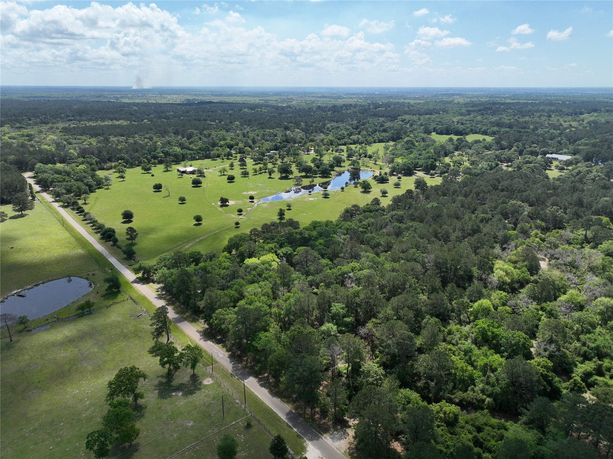 32023 Courtney Road Navasota, TX 77868 - Photo 6 of 37 a view of a city with ocean view