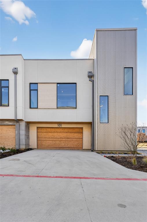1111 Raiford Road, Unit 101 Carrollton, TX 75007 - Photo 2 of 31 a front view of a house with a yard