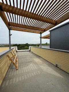 a view of kitchen with a sink and a stove top oven
