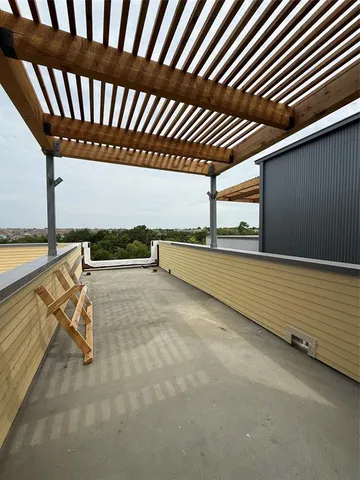 a view of kitchen with a sink and a stove top oven