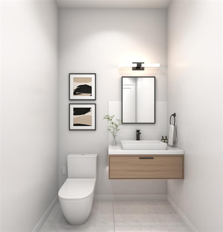 1111 Raiford Road, Unit 101 Carrollton, TX 75007 - Photo 5 of 26 a bathroom with a toilet sink and mirror