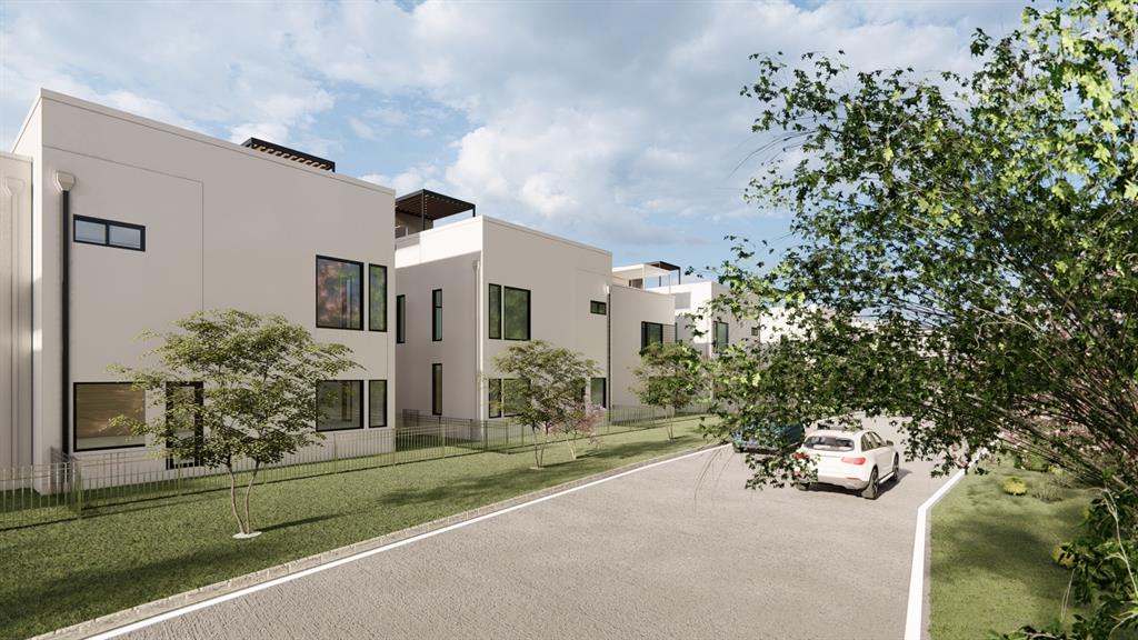 1111 Raiford Road, Unit 101 Carrollton, TX 75007 - Photo 8 of 26 a front view of a house with a yard and garage