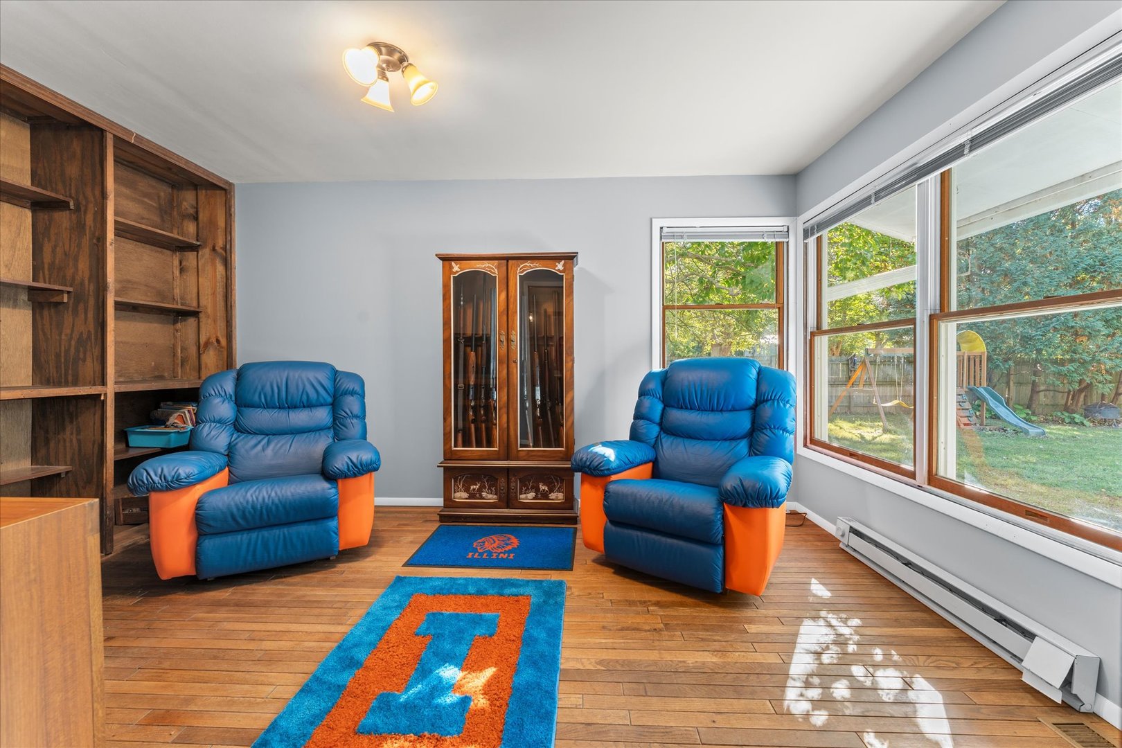 1108 Riverside Court Mahomet, IL 61853 - Photo 29 of 50 a living room with furniture and a large window