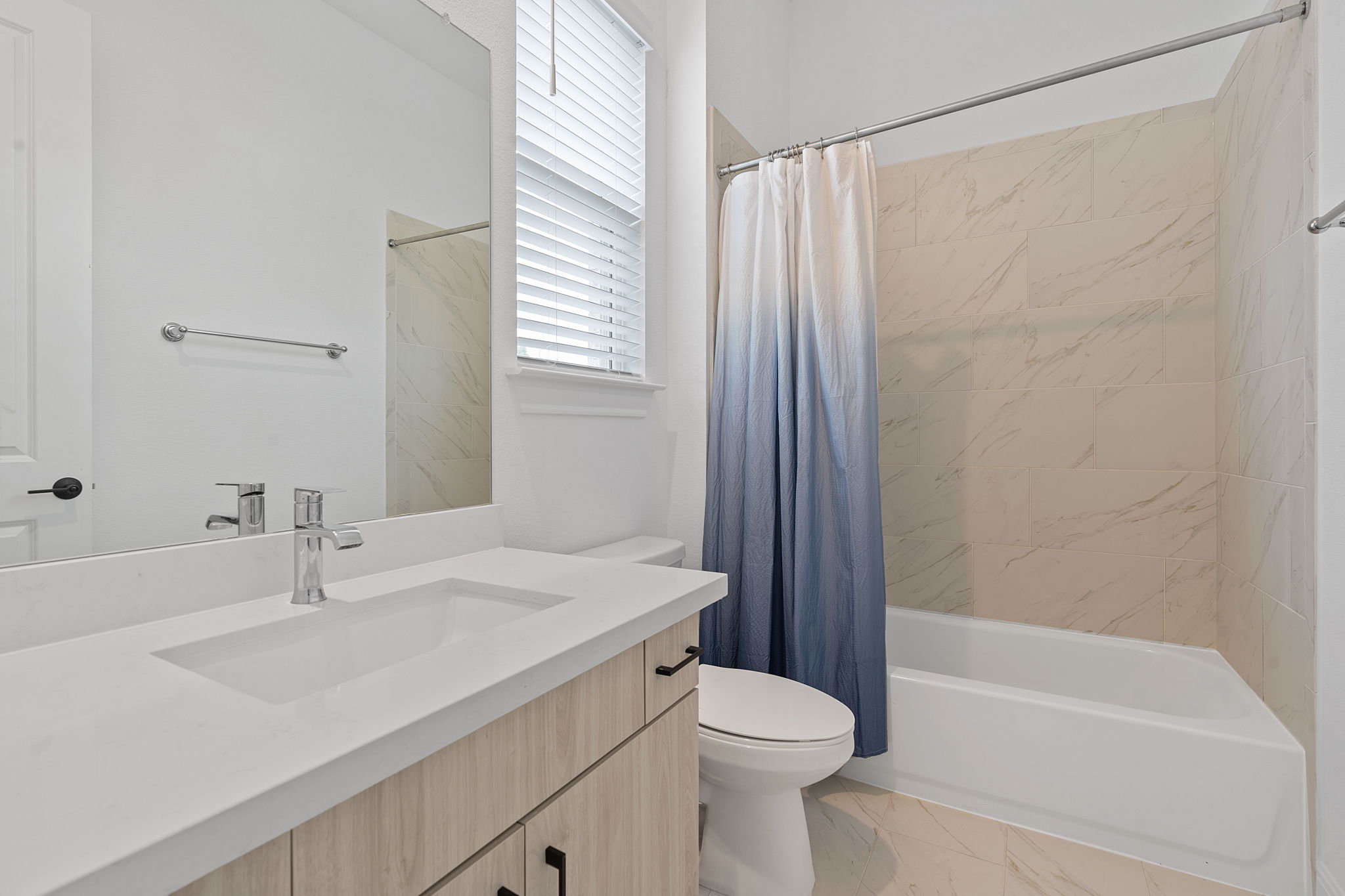 309 Pear Tree Lane Austin, TX 78737 - Photo 36 of 39 a bathroom with a sink a toilet and shower