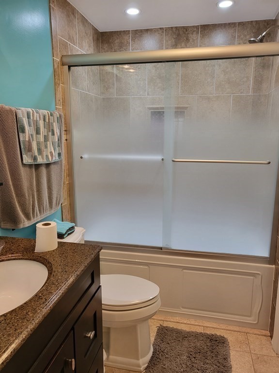 246 Lamont Street Springfield, MA 01119 - Photo 12 of 23 a bathroom with a granite countertop shower and a sink