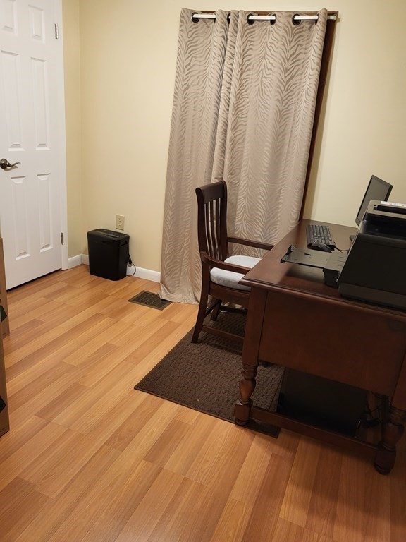 246 Lamont Street Springfield, MA 01119 - Photo 14 of 23 a bedroom with a bed and a desk