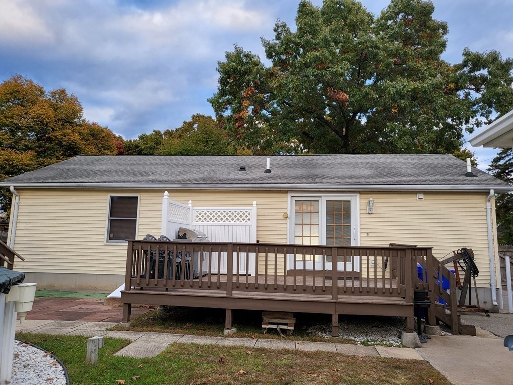 246 Lamont Street Springfield, MA 01119 - Photo 20 of 23 a view of a wooden deck with a yard