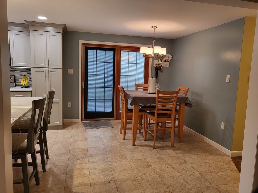 246 Lamont Street Springfield, MA 01119 - Photo 9 of 23 a view of a dining room with furniture and chandelier