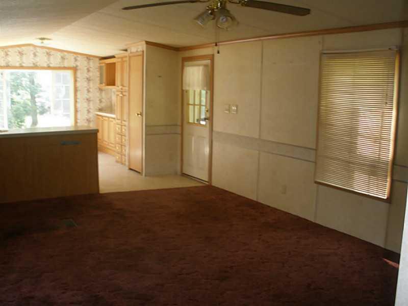 327 Howland Road Lagrange, ME 04453 - Photo 9 of 26 Living Room.