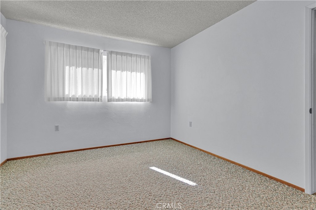 123 19th Street Paso Robles, CA 93446 - Photo 18 of 24 an empty room with a window