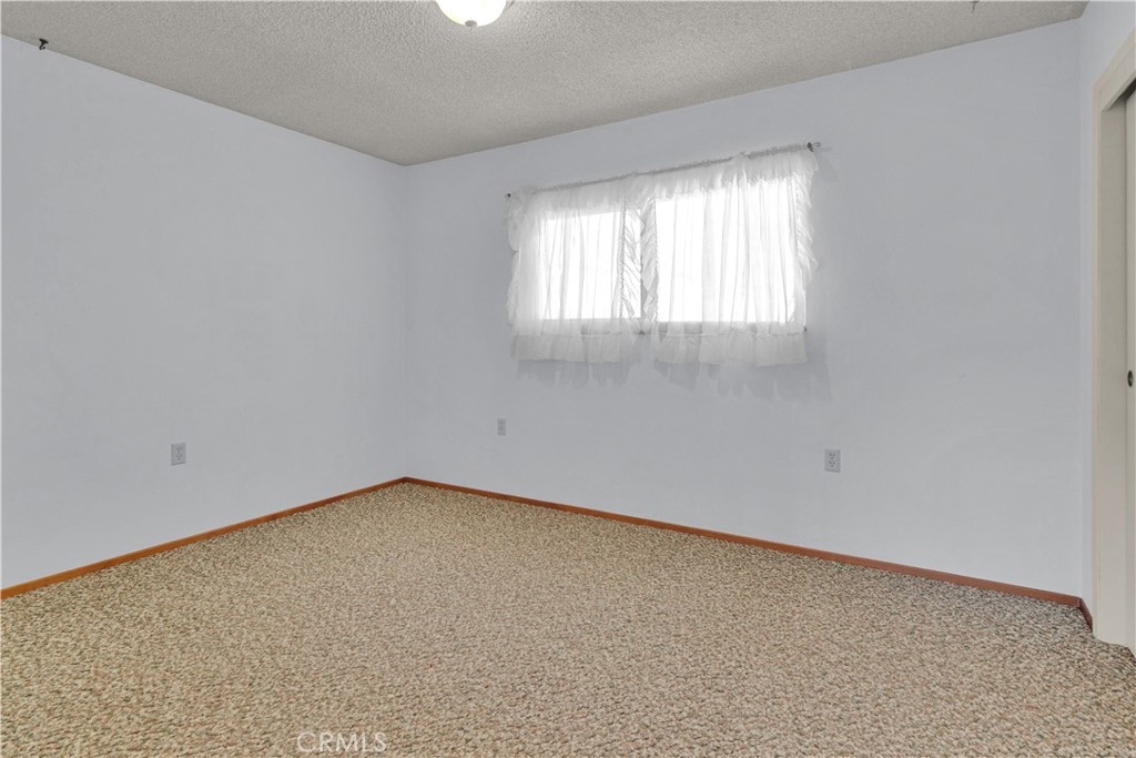 123 19th Street Paso Robles, CA 93446 - Photo 20 of 24 an empty room with a window