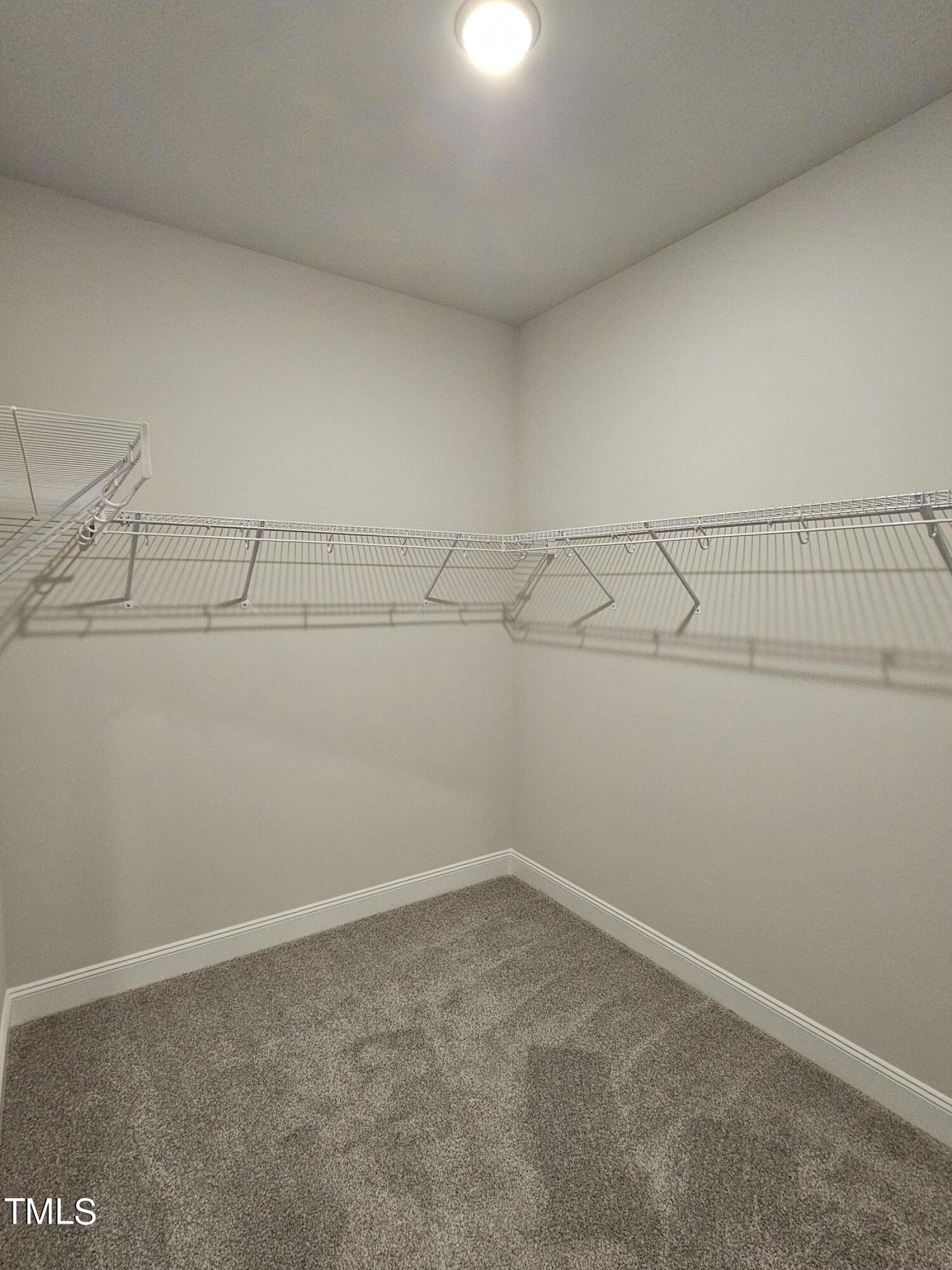28 Decatur Drive Fuquay-Varina, NC 27526 - Photo 14 of 26 Primary walk in closet