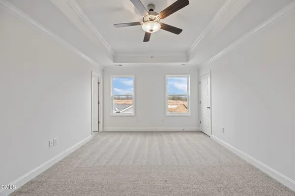 a bathroom with double sink and a mirror