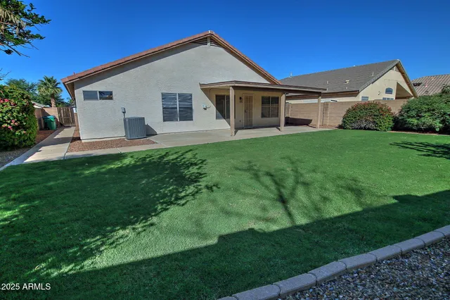 a view of a backyard with a garden