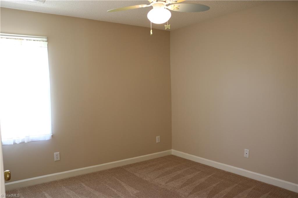 2629 Celeste Road Walkertown, NC 27051 - Photo 14 of 23 This house has three bedrooms.