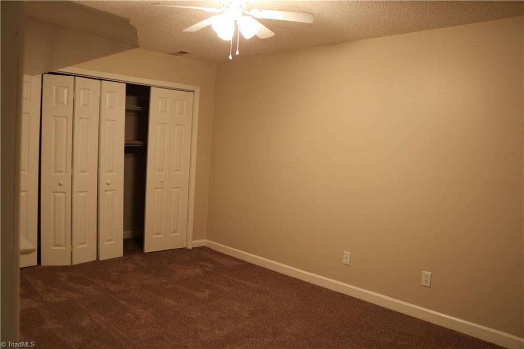 2629 Celeste Road Walkertown, NC 27051 - Photo 17 of 23 Bonus room in the basement. Nice closet for storage. It would make a great game or media room. Owner was using it as an office.