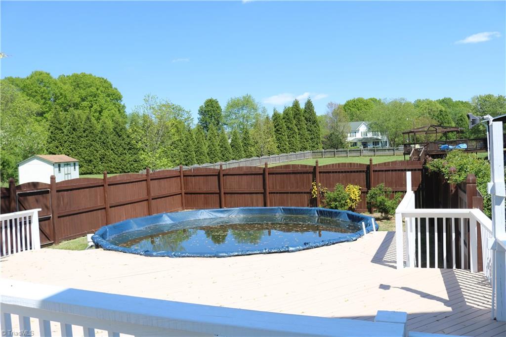 2629 Celeste Road Walkertown, NC 27051 - Photo 20 of 23 Pool has a privacy fence around it.