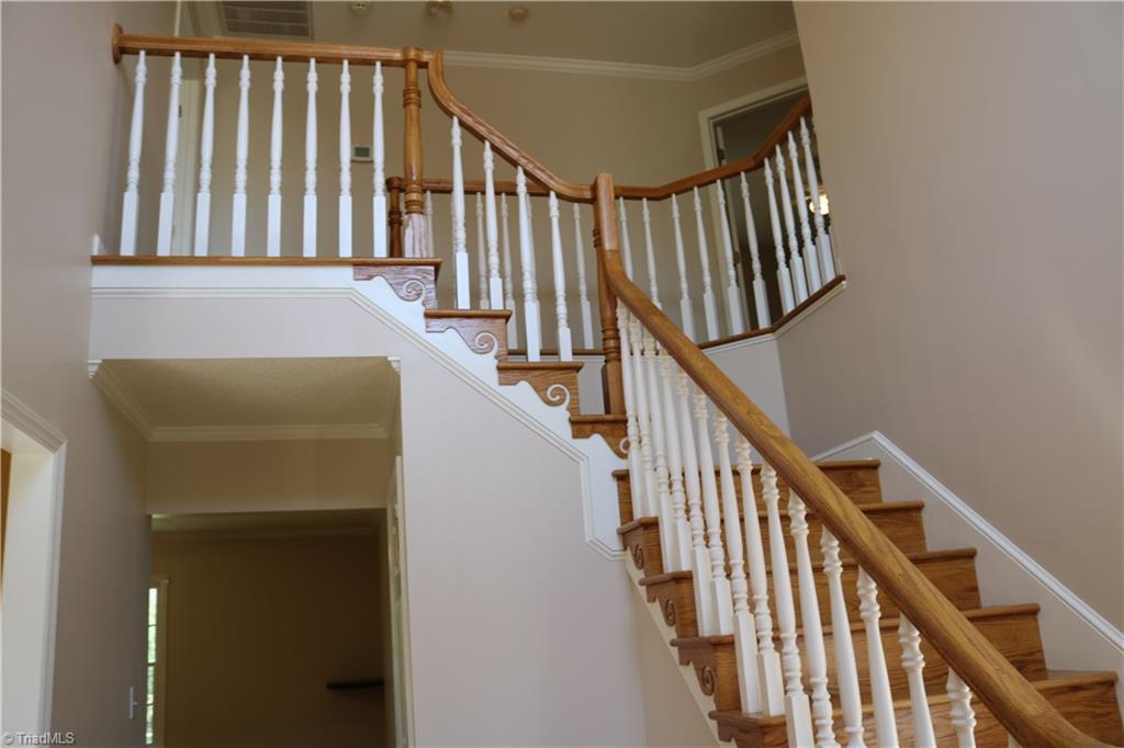 2629 Celeste Road Walkertown, NC 27051 - Photo 3 of 23 Beautiful hardwood stair case you when you enter the front door.