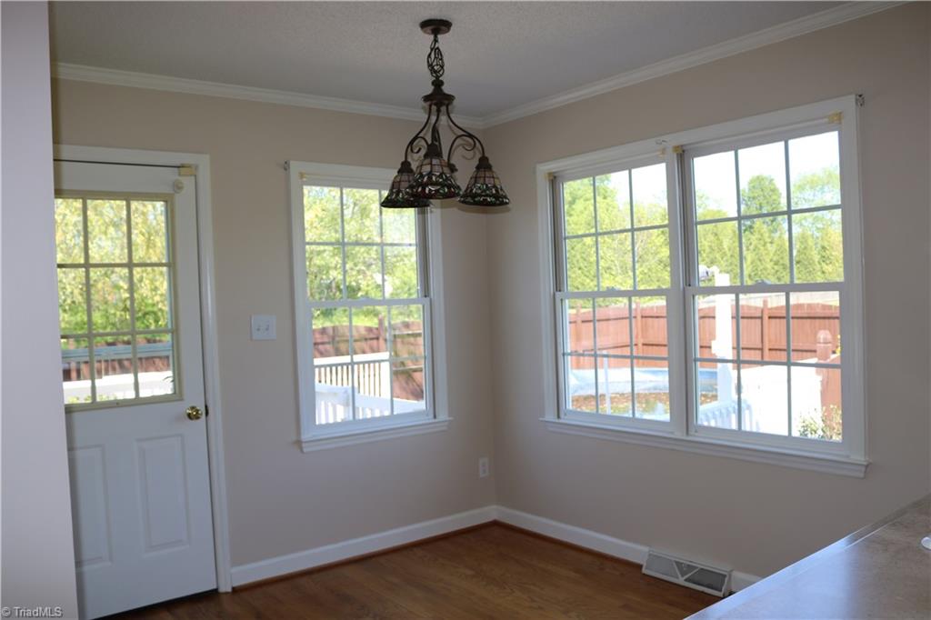 2629 Celeste Road Walkertown, NC 27051 - Photo 5 of 23 Breakfast nook with plenty of sunlight. Easy access to the deck to take your morning coffee outside. Also overlooks the pool.