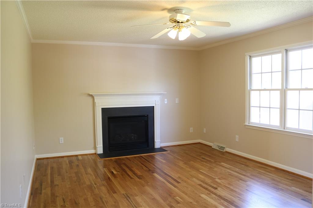 2629 Celeste Road Walkertown, NC 27051 - Photo 6 of 23 The gas fireplace will make this room nice and cozy during the colder months.