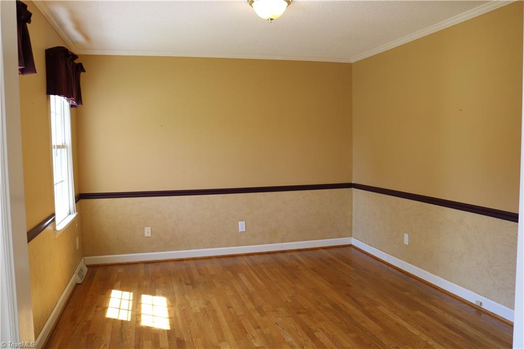 2629 Celeste Road Walkertown, NC 27051 - Photo 8 of 23 This flex space is wonderful. It could be a formal living room or add some french doors and make it an office.