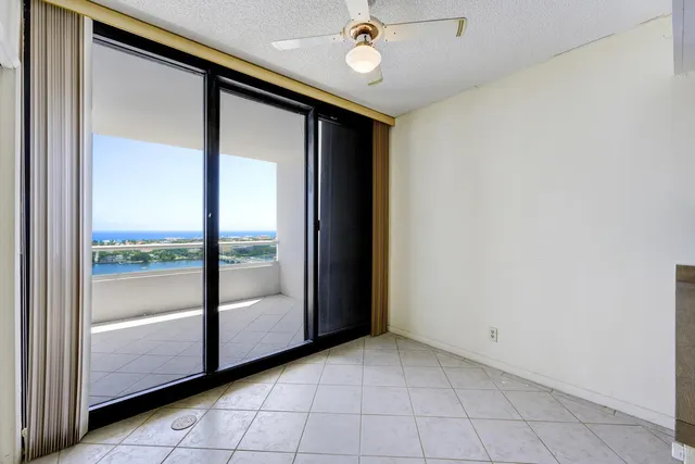 a kitchen with a sink cabinets and window