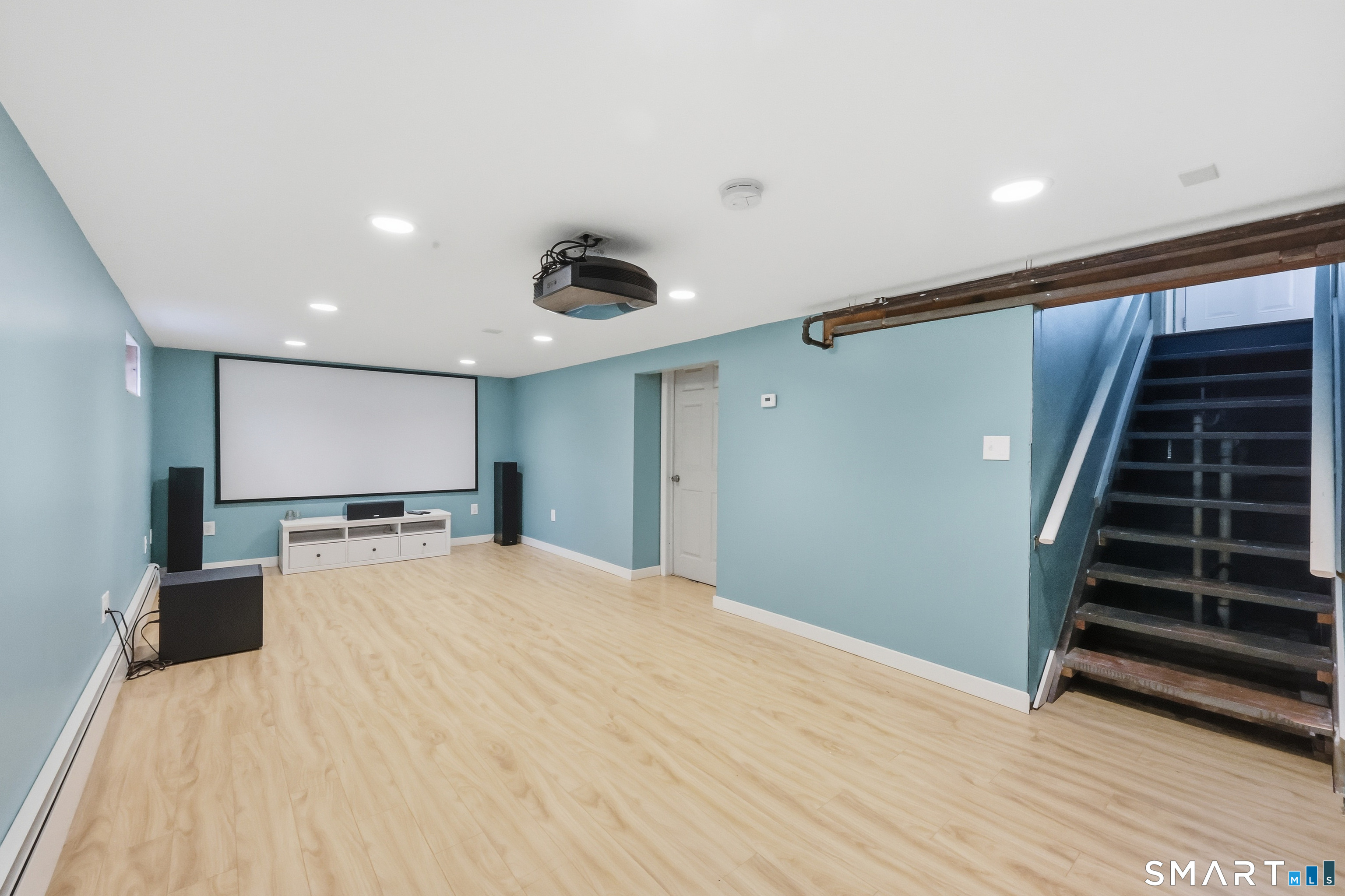 89 North Hoadley Street Naugatuck, CT 06770 - Photo 22 of 28 a view of a livingroom with wooden floor and staircase