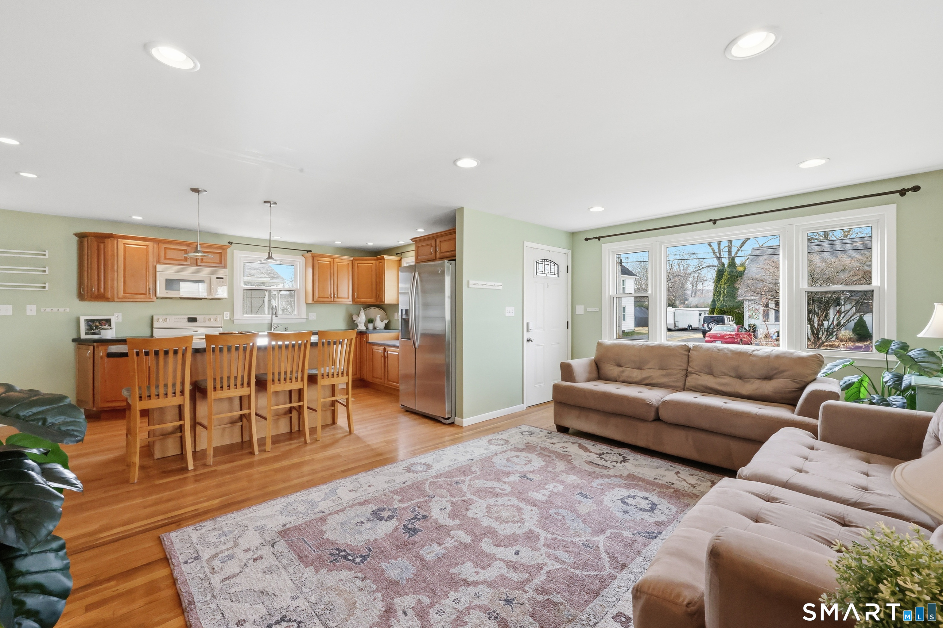 89 North Hoadley Street Naugatuck, CT 06770 - Photo 5 of 28 a living room with furniture dining area and a rug