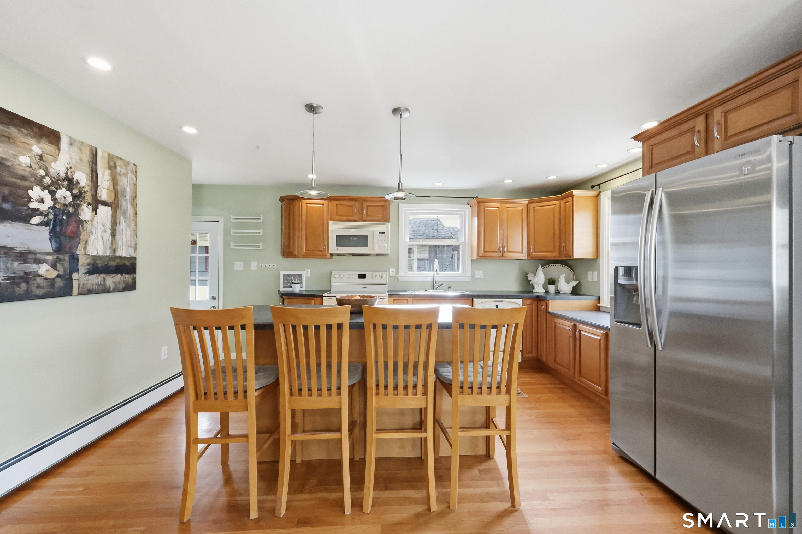 89 North Hoadley Street Naugatuck, CT 06770 - Photo 7 of 28 a view of a dining room with furniture window and wooden floor