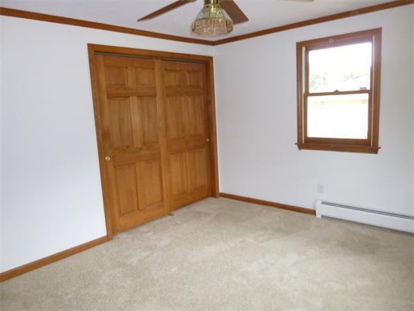 145 Shea Road West Brookfield, MA 01585 - Photo 6 of 11 an empty room with windows and closet