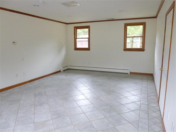 145 Shea Road West Brookfield, MA 01585 - Photo 8 of 11 an empty room with windows