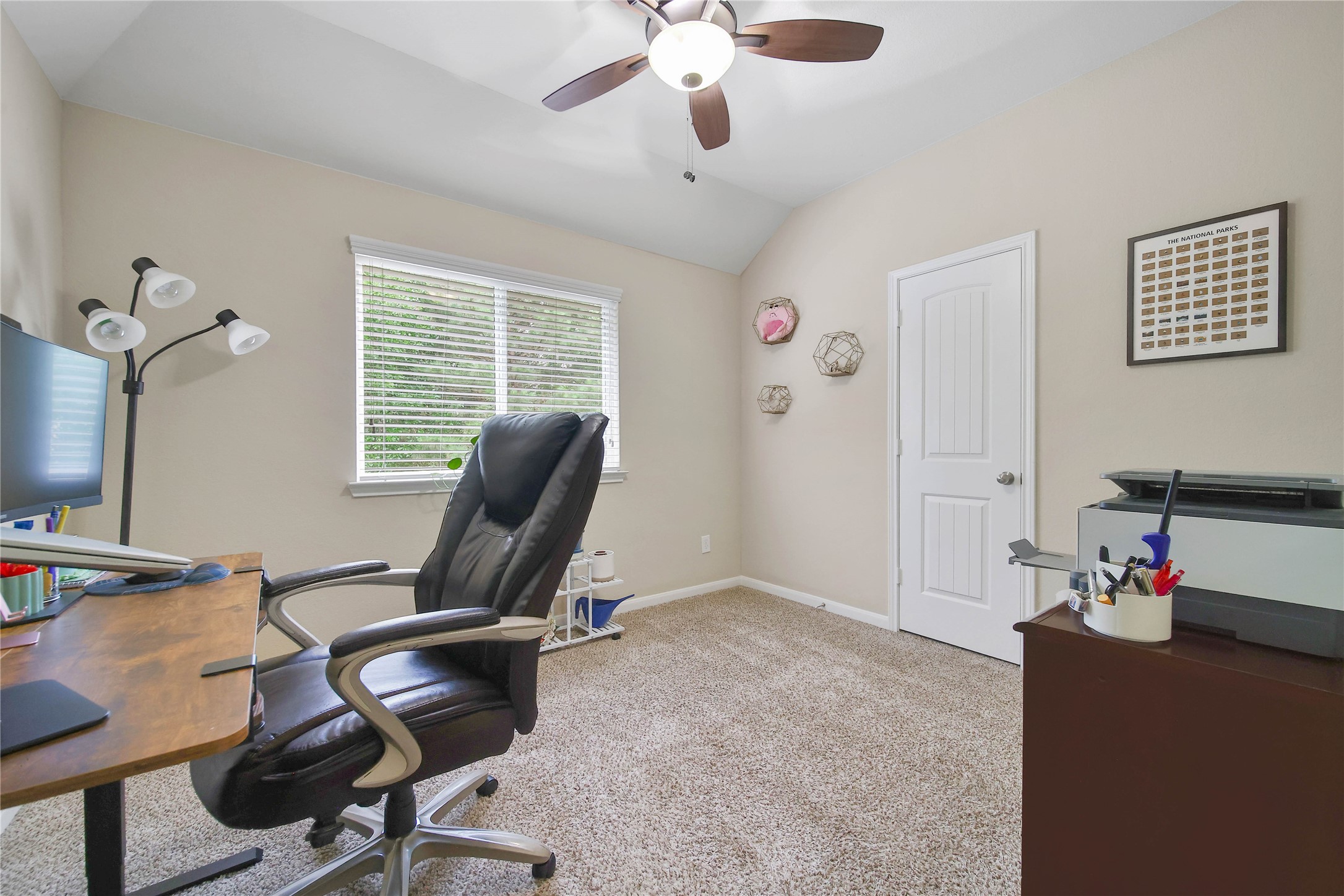 9223 Wapiti Trail Conroe, TX 77303 - Photo 36 of 45 a workspace with furniture hardwood and a window