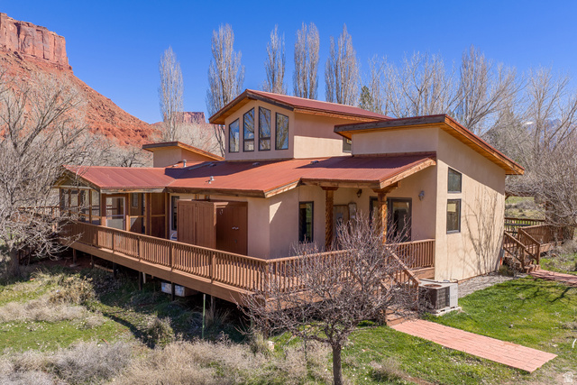 423 Amber Lane Moab, UT 84532 - Photo 6 of 63 Back of house with large deck.