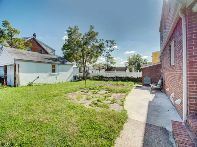a view of a house with a big yard