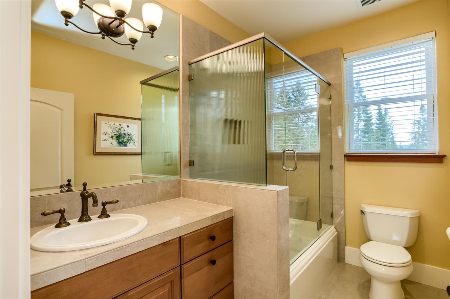 7672 Hyatt Prairie Road Ashland, OR 97520 - Photo 17 of 35 Second bath on the main level has a glas