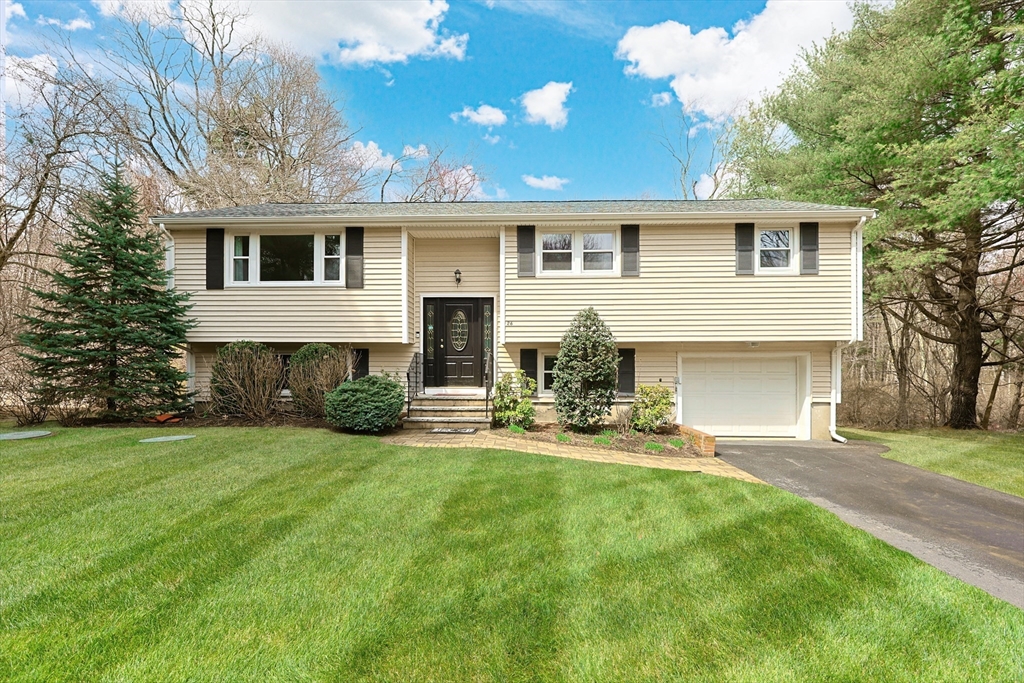 26 Beaver Brook Road Sharon, MA 02067 - Photo 1 of 42 a front view of house with yard and seating area