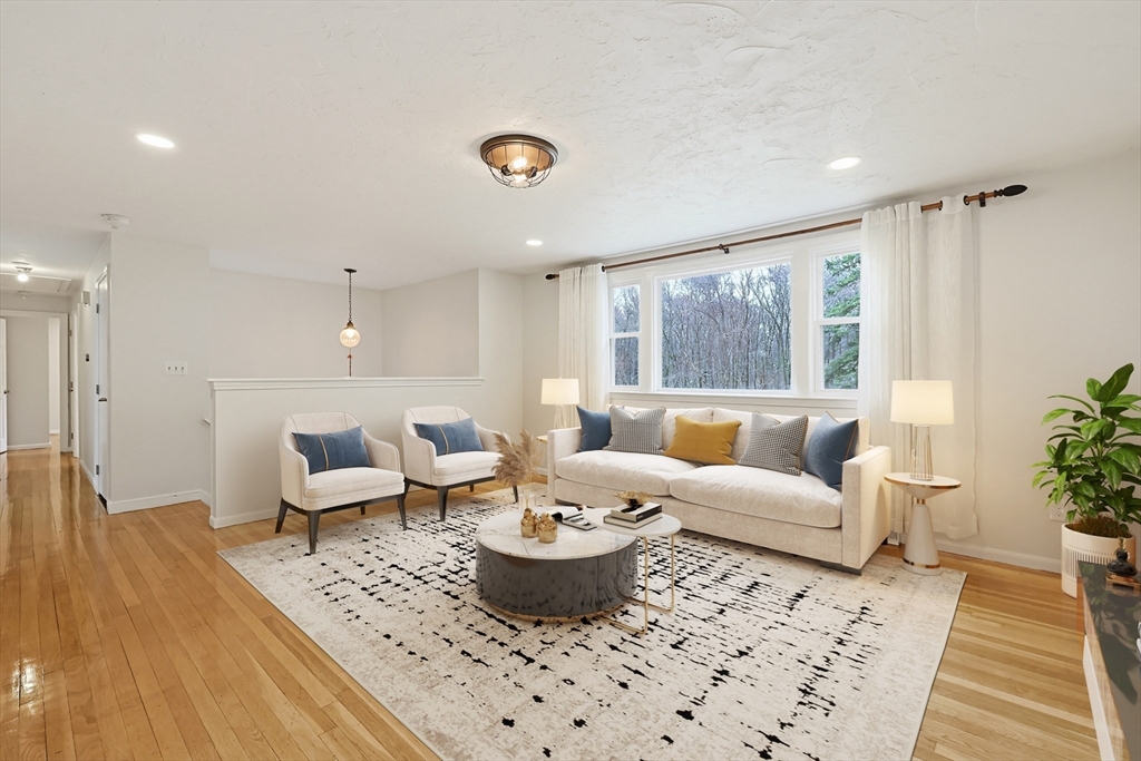 26 Beaver Brook Road Sharon, MA 02067 - Photo 2 of 42 a living room with furniture and a large window