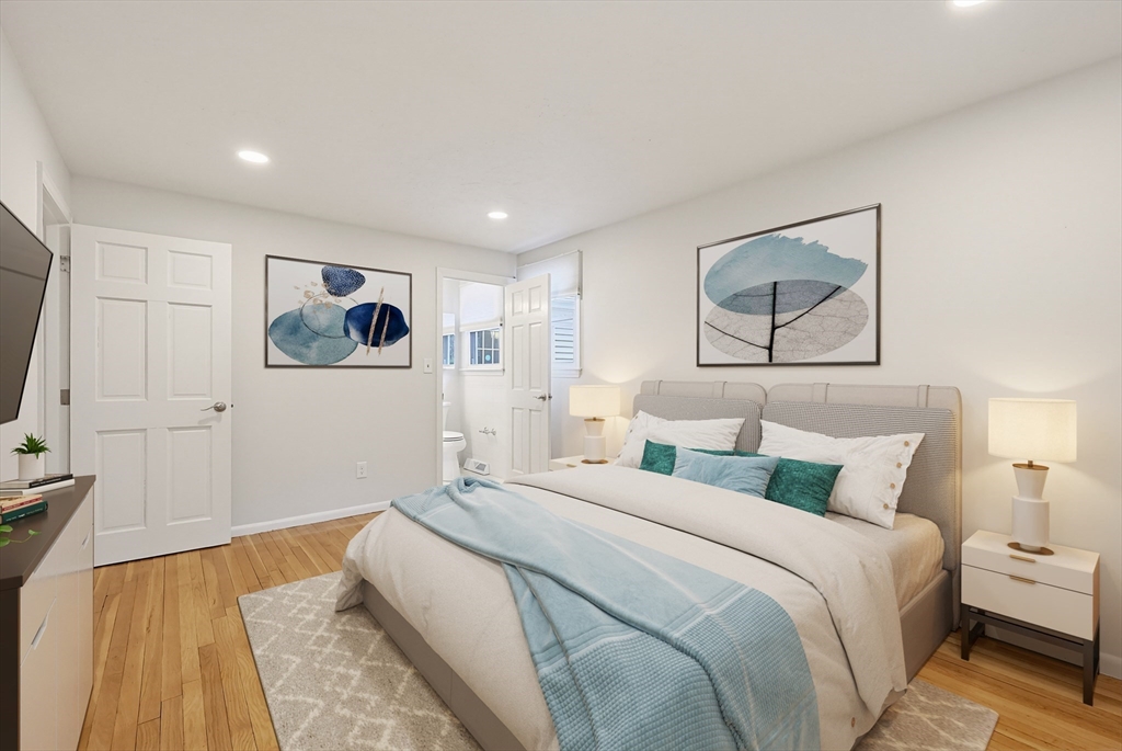 26 Beaver Brook Road Sharon, MA 02067 - Photo 21 of 42 a bedroom with a bed and a painting on the wall