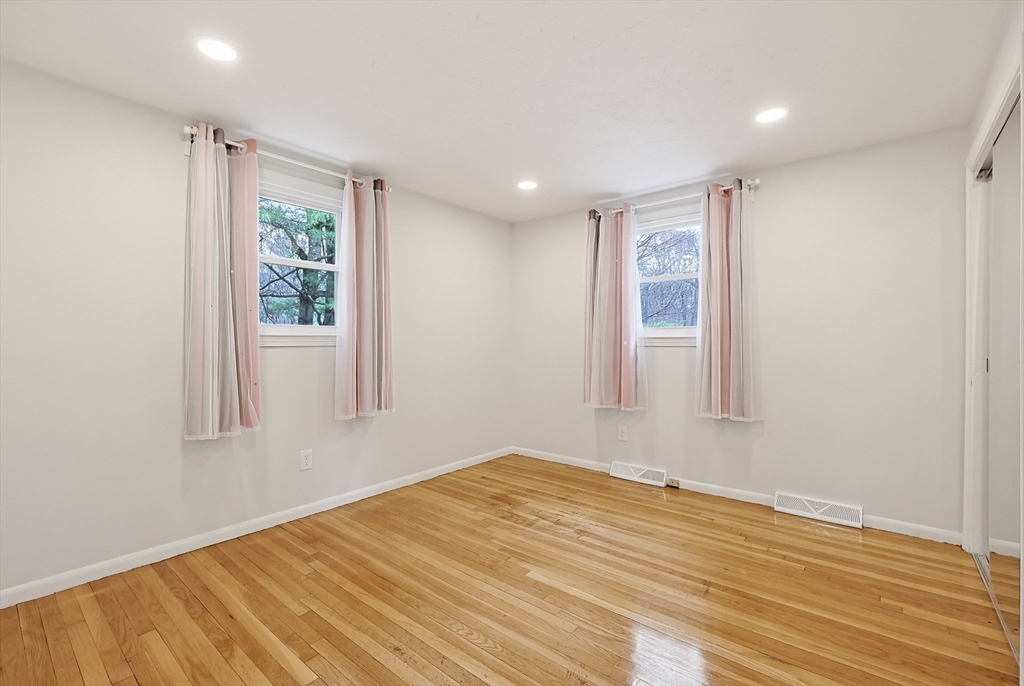 26 Beaver Brook Road Sharon, MA 02067 - Photo 25 of 42 a view of empty room with wooden floor and fan