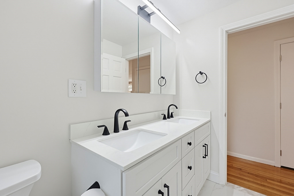 26 Beaver Brook Road Sharon, MA 02067 - Photo 29 of 42 a bathroom with a sink and a mirror