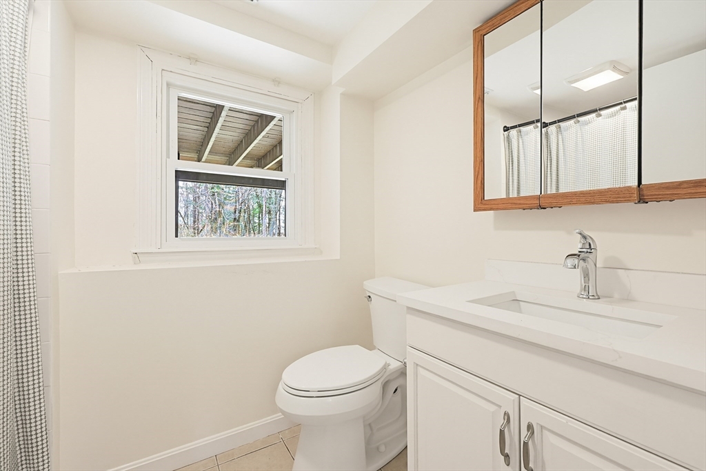 26 Beaver Brook Road Sharon, MA 02067 - Photo 38 of 42 a bathroom with a sink a toilet and vanity