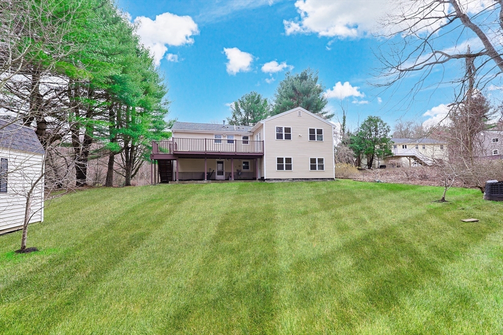 26 Beaver Brook Road Sharon, MA 02067 - Photo 40 of 42 a view of a house with a yard