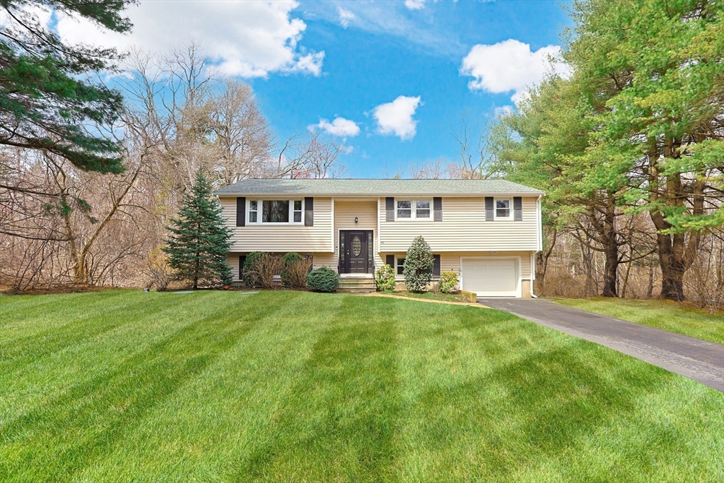 26 Beaver Brook Road Sharon, MA 02067 - Photo 41 of 42 a view of a house with backyard and sitting area