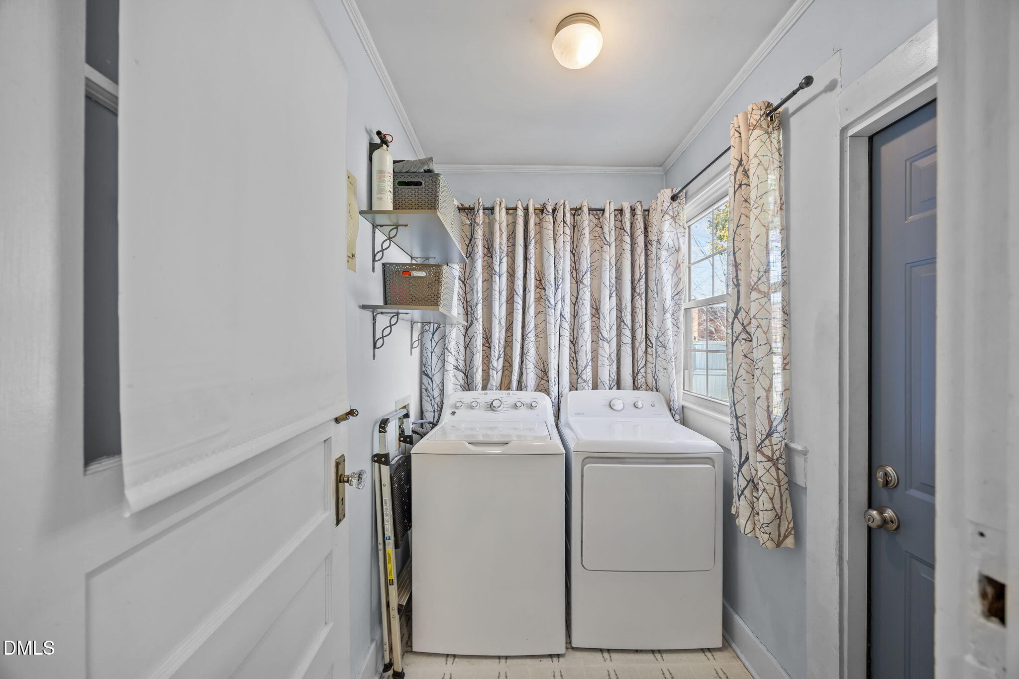 128 Moore Street Graham, NC 27253 - Photo 15 of 45 a utility room with dryer and washer