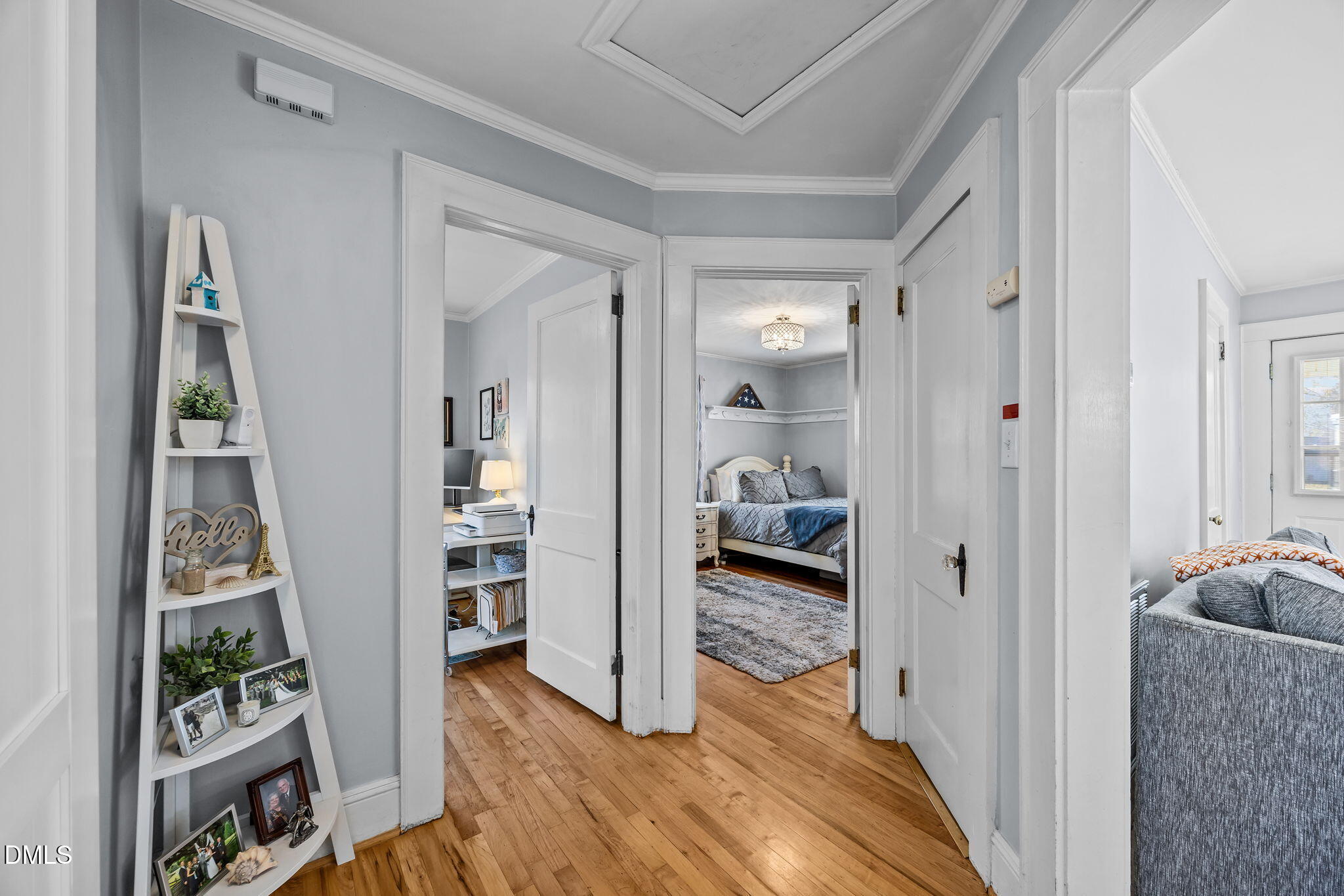 128 Moore Street Graham, NC 27253 - Photo 17 of 45 a view of livingroom with furniture and wooden floor