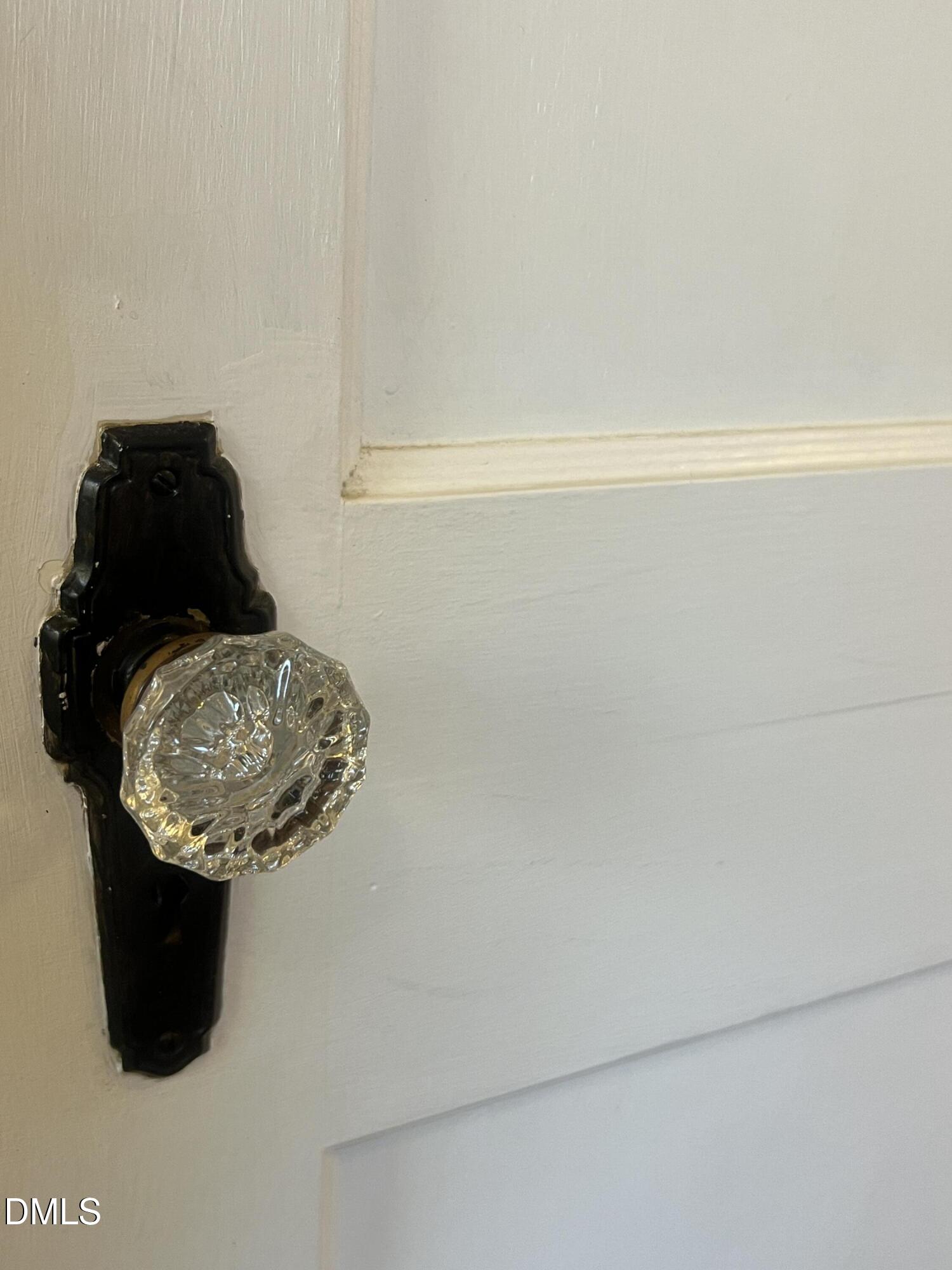 128 Moore Street Graham, NC 27253 - Photo 26 of 45 a close view of door lock