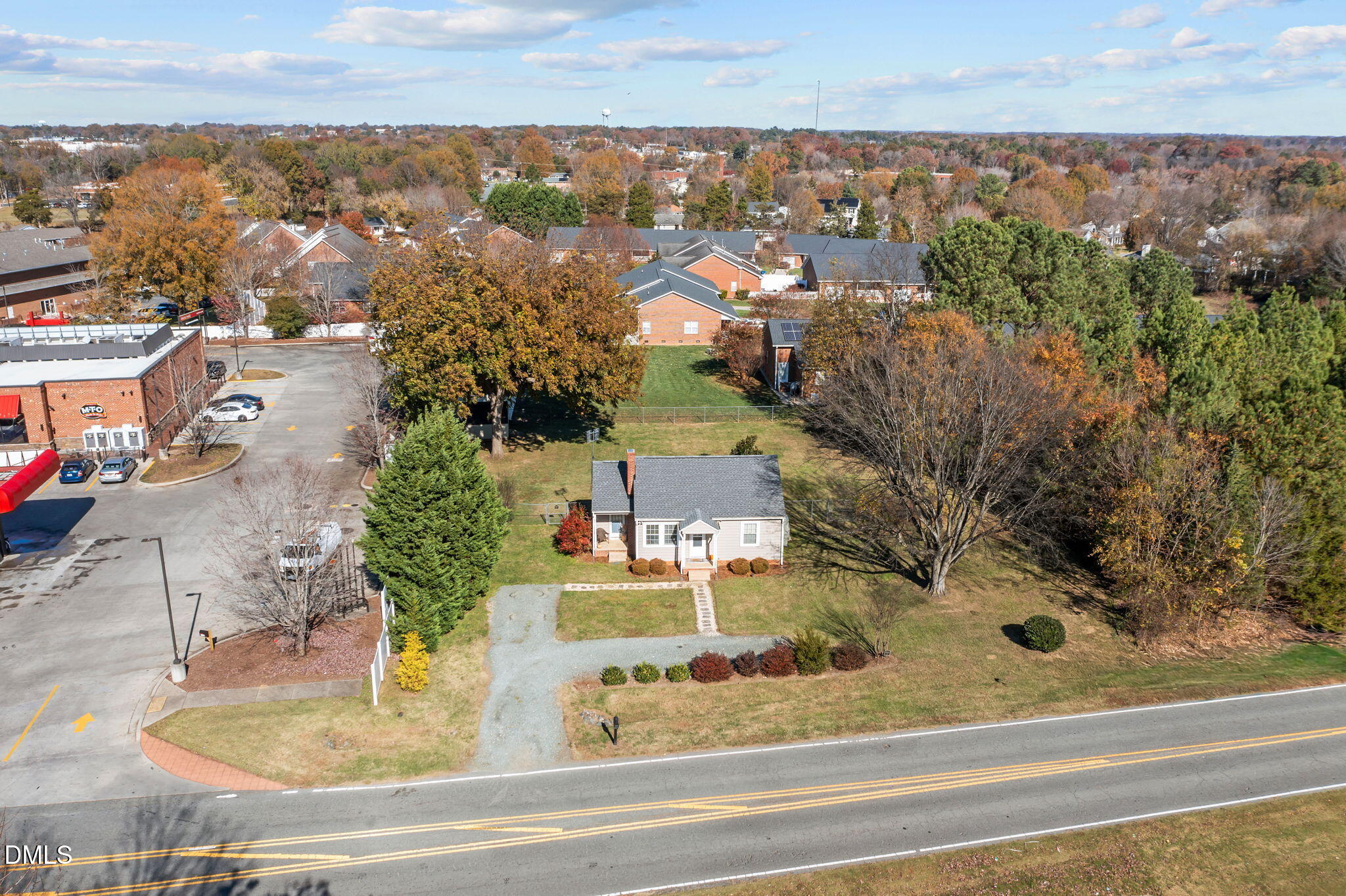 128 Moore Street Graham, NC 27253 - Photo 33 of 45 an aerial view of residential houses with outdoor space