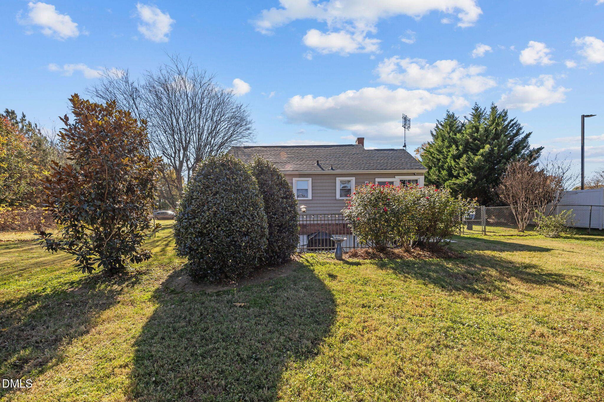 128 Moore Street Graham, NC 27253 - Photo 36 of 42 a view of a house with a yard