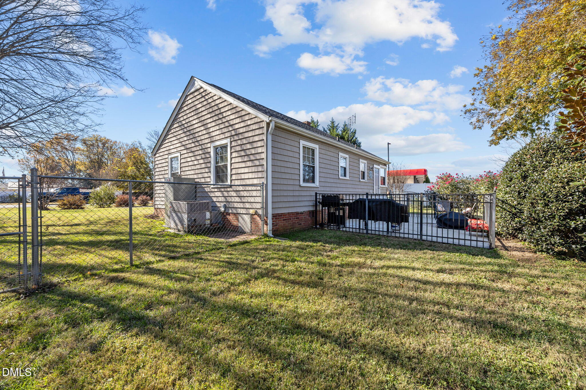 128 Moore Street Graham, NC 27253 - Photo 38 of 45 a view of a house with a swimming pool