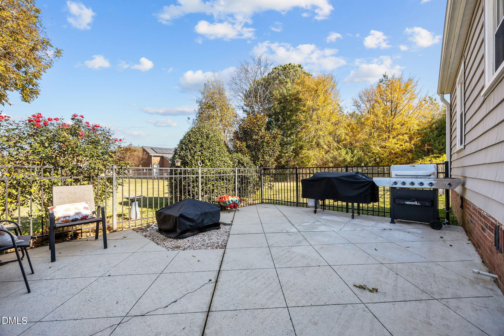 128 Moore Street Graham, NC 27253 - Photo 40 of 45 a view of a terrace with seating space